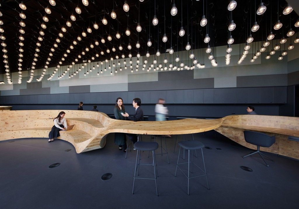 It incorporates desks, seating area and a reception desk